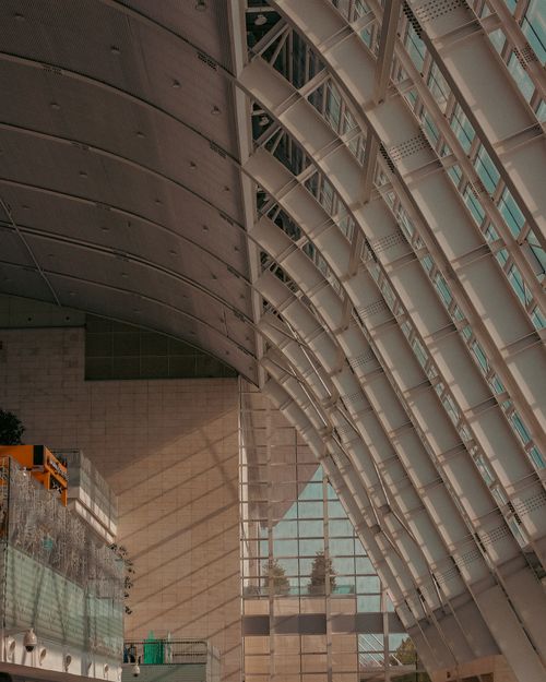 Free Beautiful modern architecture featuring a glass roof and geometric design. Stock Photo