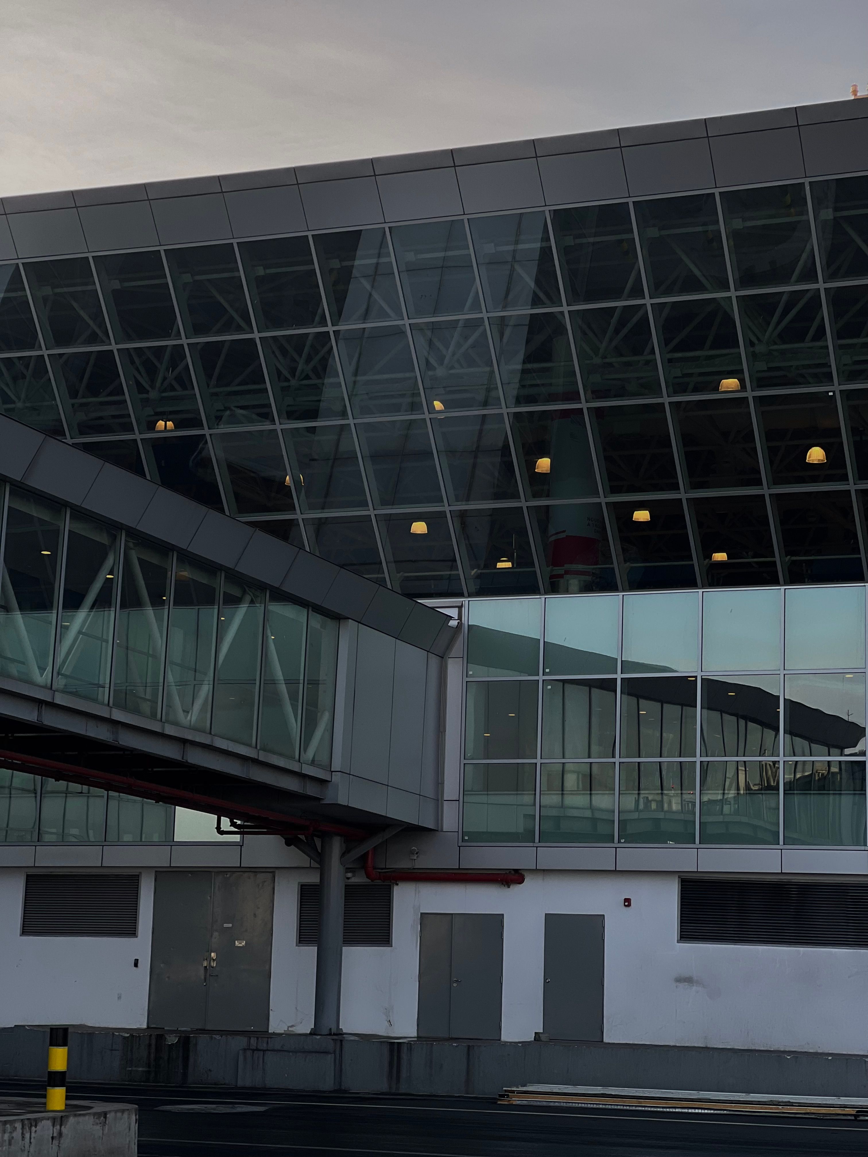 Glass walkway at an airport terminal