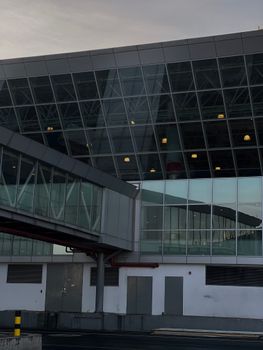 Glass facade of Bole International Airport showcasing modern architecture in Addis Ababa, Ethiopia.