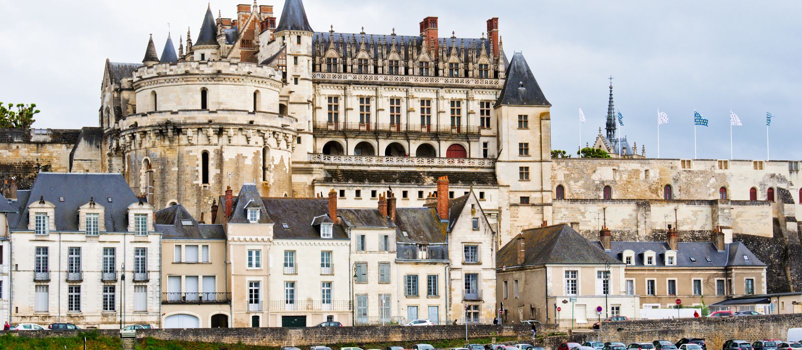 The historic Château d'Amboise with its striking architecture along the Loire River, perfect for cultural tourism.