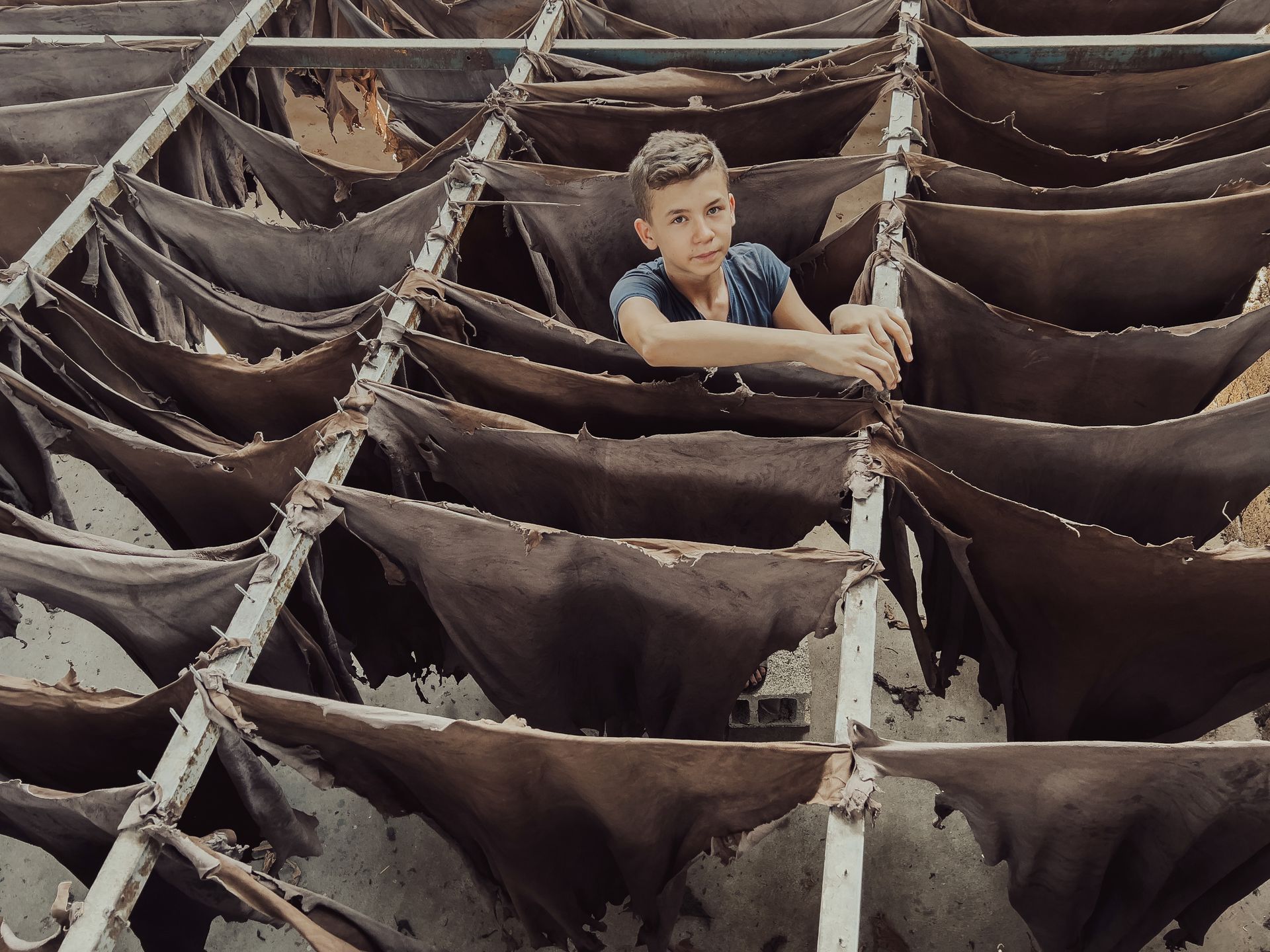Stacked leather hides in a tannery workshop