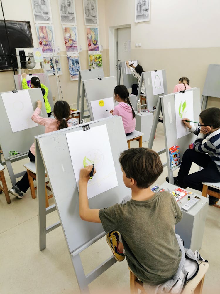 Children Drawing In Class