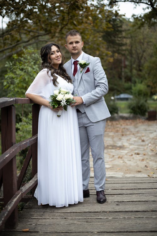 Smiling Newlyweds in Park