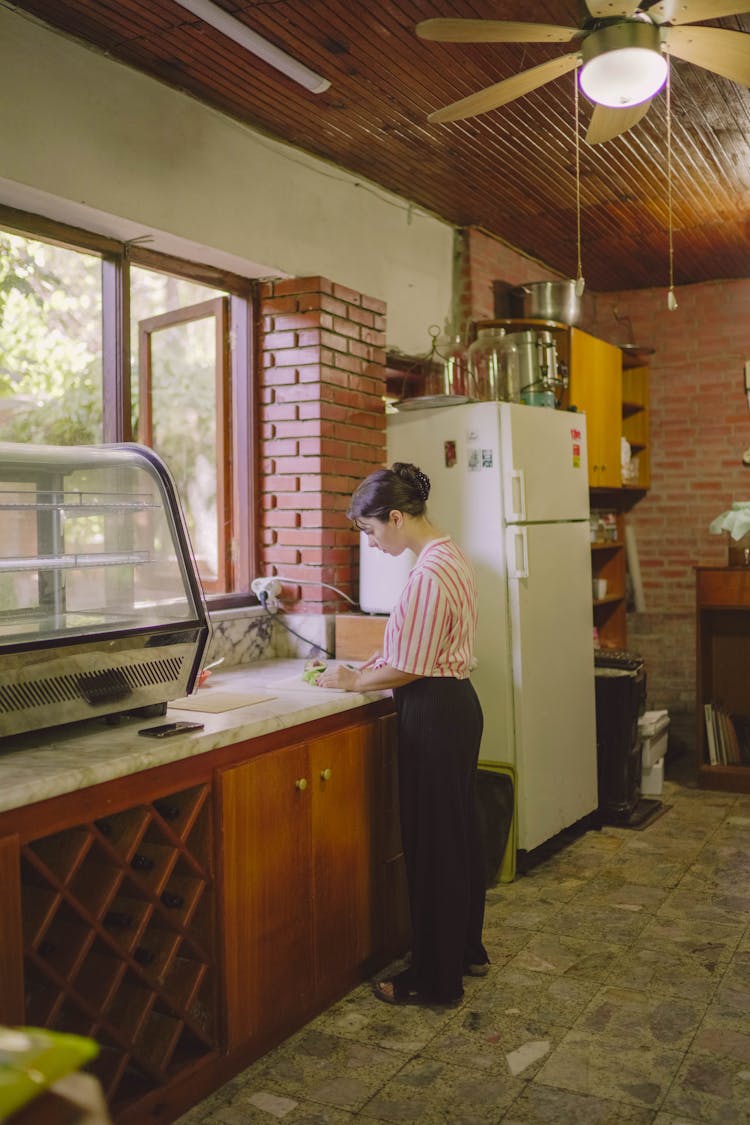 Woman Working In Kitchen