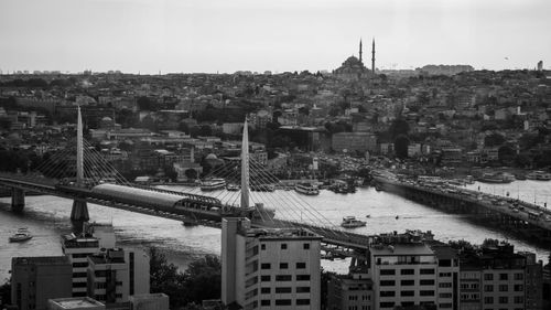 Free Stunning aerial view of Istanbul's cityscape featuring the Bosporus Bridge in black and white. Stock Photo
