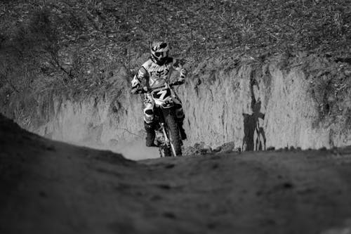 Riding Motocross on Dirt Road