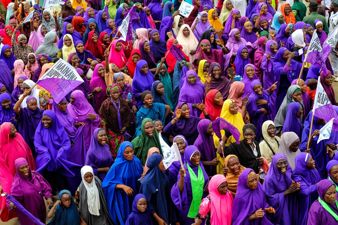 Religious Roles By Dress Crowd of People Wearing Colorful Religious Dress Demonstrating · Free ...