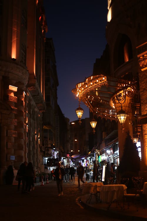 Busy illuminated City Street in Evening Time