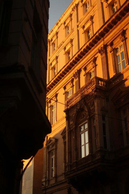 Free A sunlit historic building in Istanbul showcasing beautiful vintage architectural details at sunset. Stock Photo