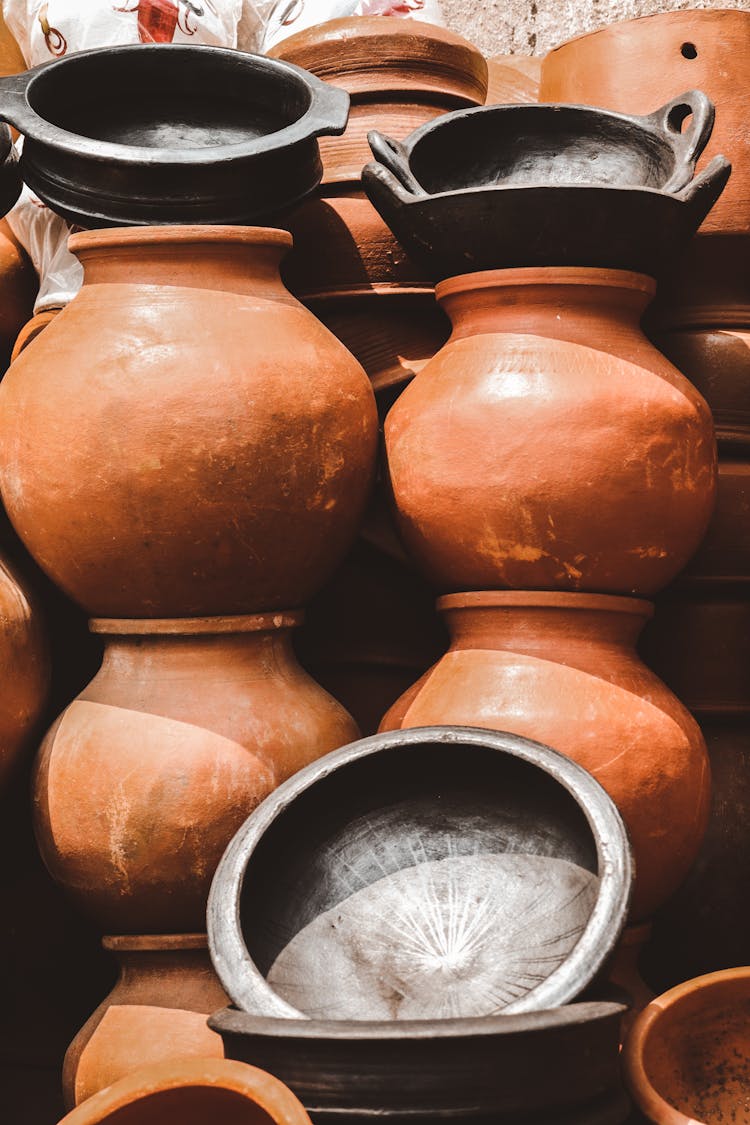 Stack Of Clay Jugs And Bowls