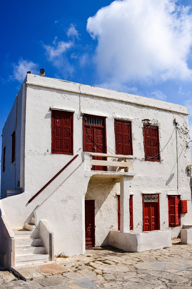 White, Vintage House In Town