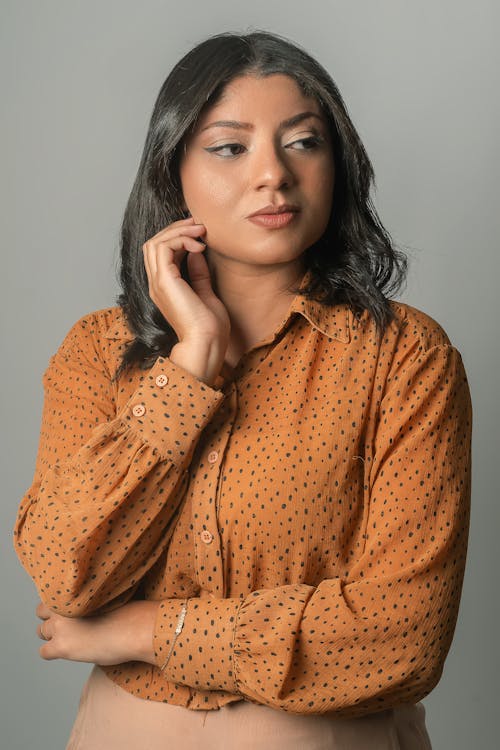 Portrait of Model in Orange Shirt
