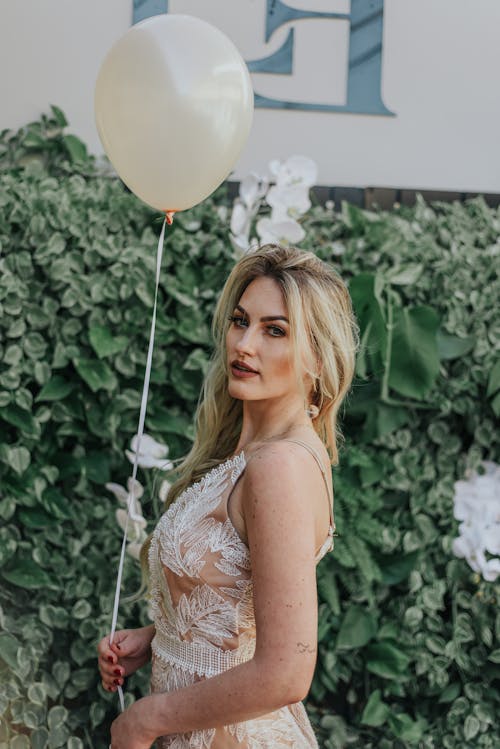 Woman Holding Balloon