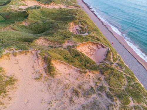 Gratis stockfoto met dronefoto, duinen, gras bedekt