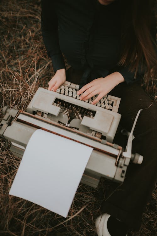 Woman with Vintage Typewriter