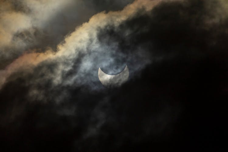 Solar Eclipse Through Clouds