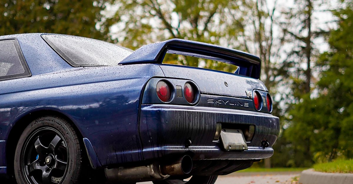 Rear View or a Blue Nissan Skyline Car · Free Stock Photo