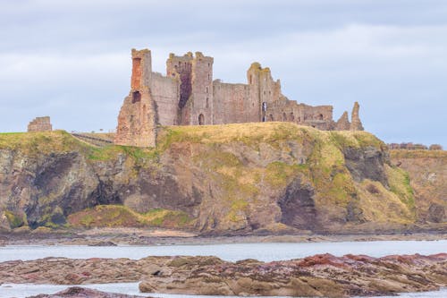 Free stock photo of beach, castle, cliff Stock Photo