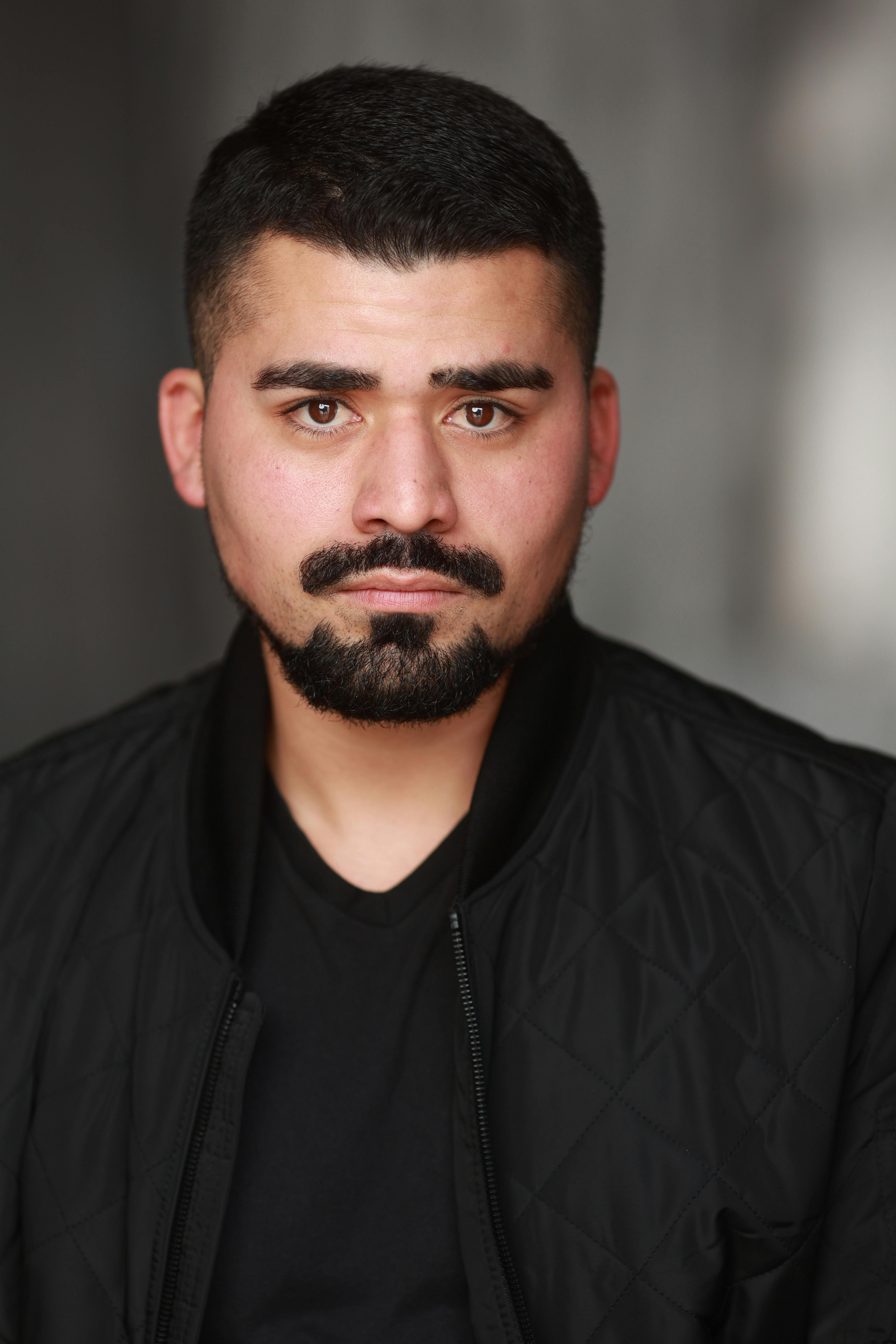 Close-up portrait of a man with a mustache and beard in Los Angeles.