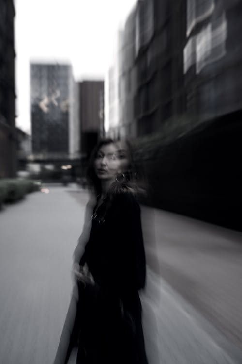 Brunette Woman in Coat on Street