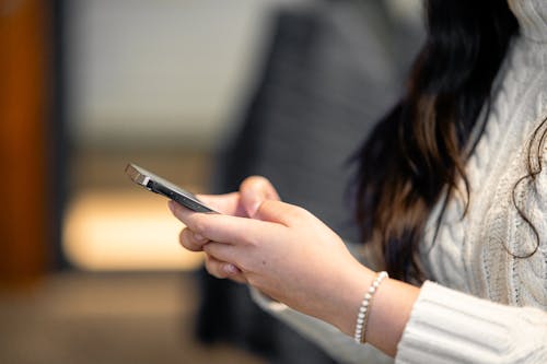 Smartphone in Woman Hands