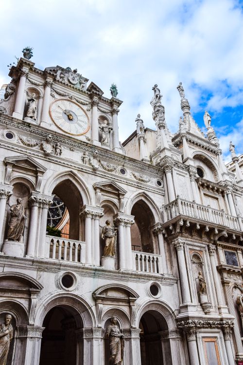Free Low angle view of Doge's Palace showcasing Venetian Gothic architecture in Venice, Italy. Stock Photo