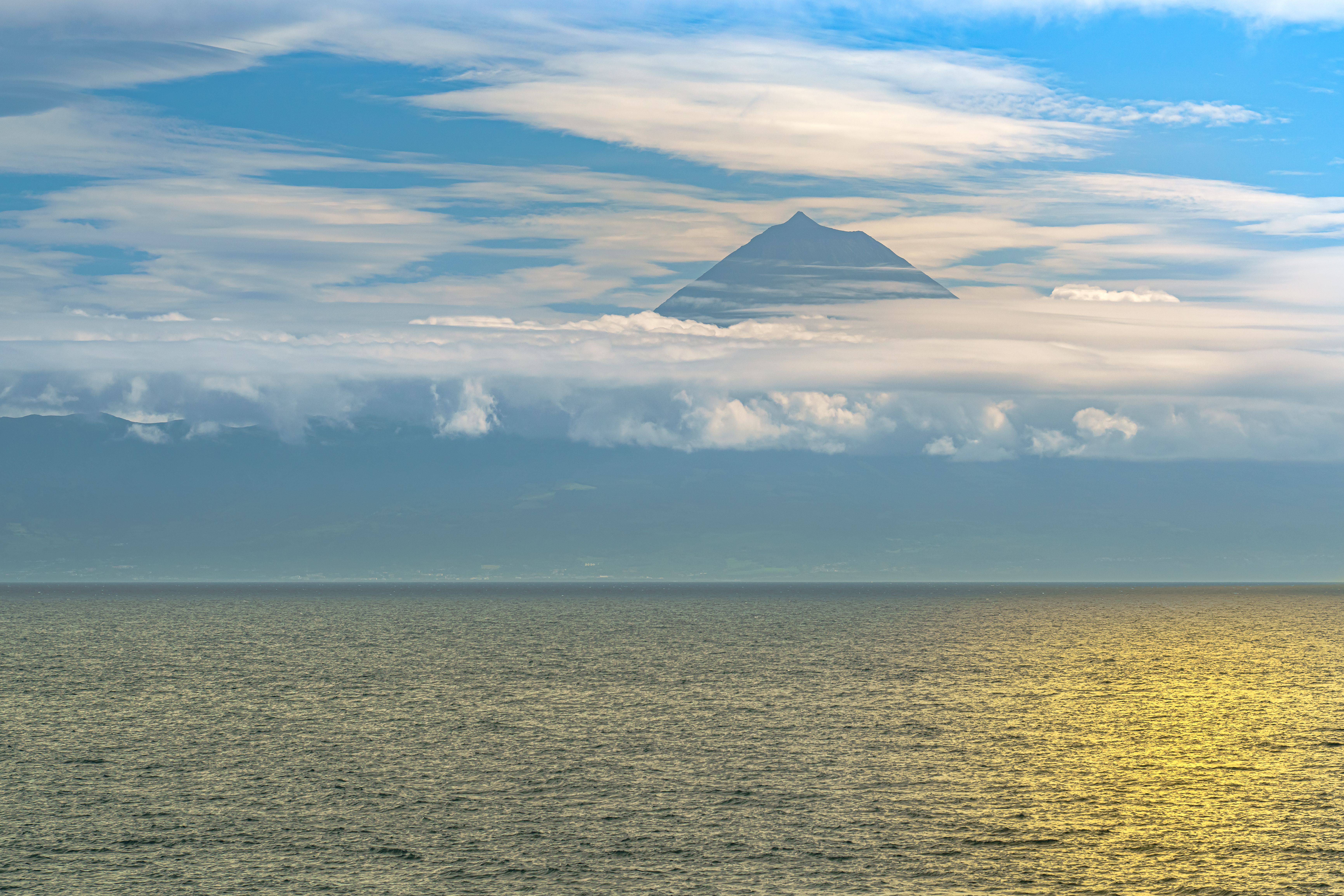 Sea and a distant mountain covered by clouds, Sao Tome and Principe