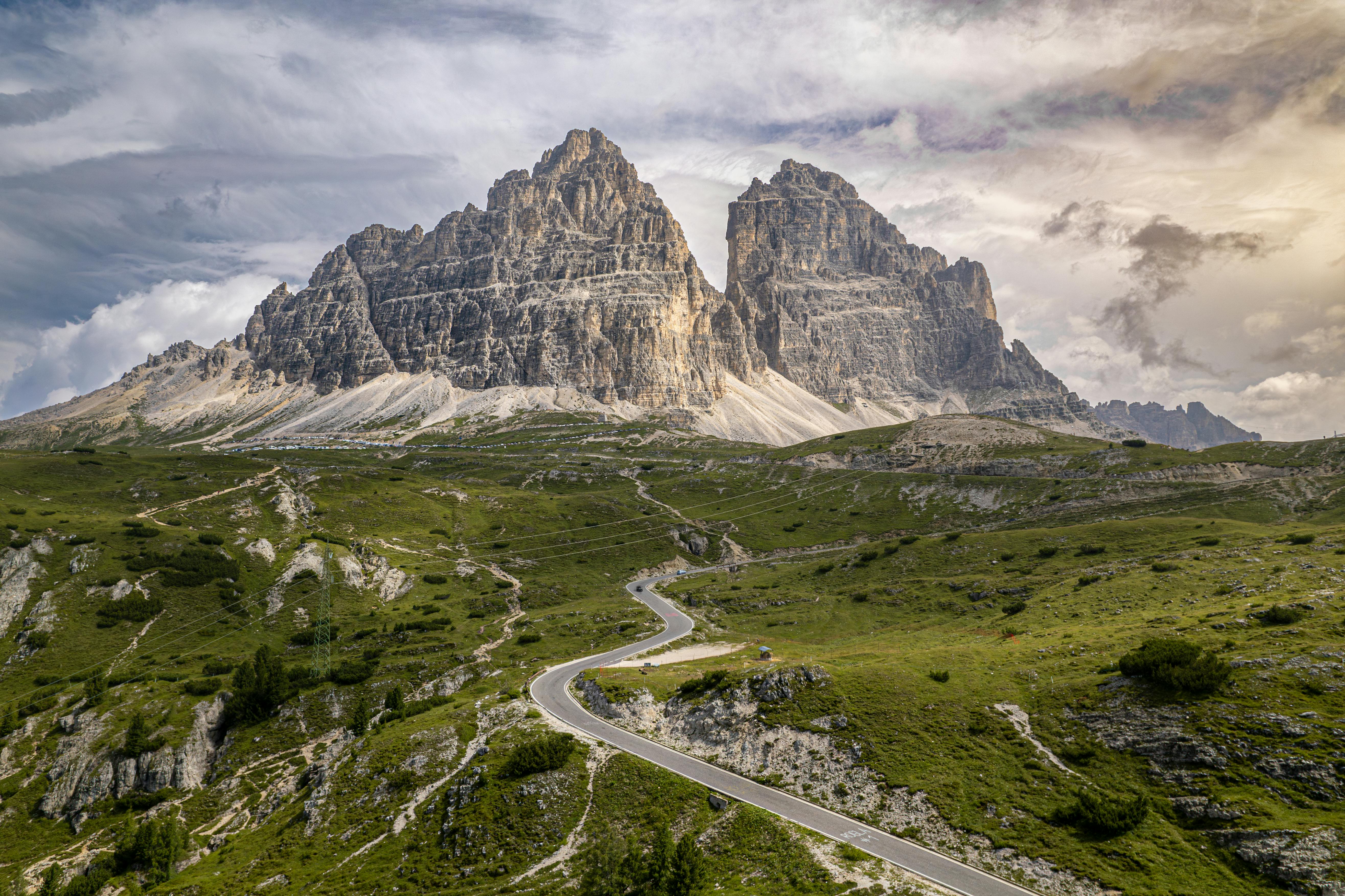 A breathtaking aerial view of the stunning Tre Cime di Lavaredo mountains in Italy's Dolomites.