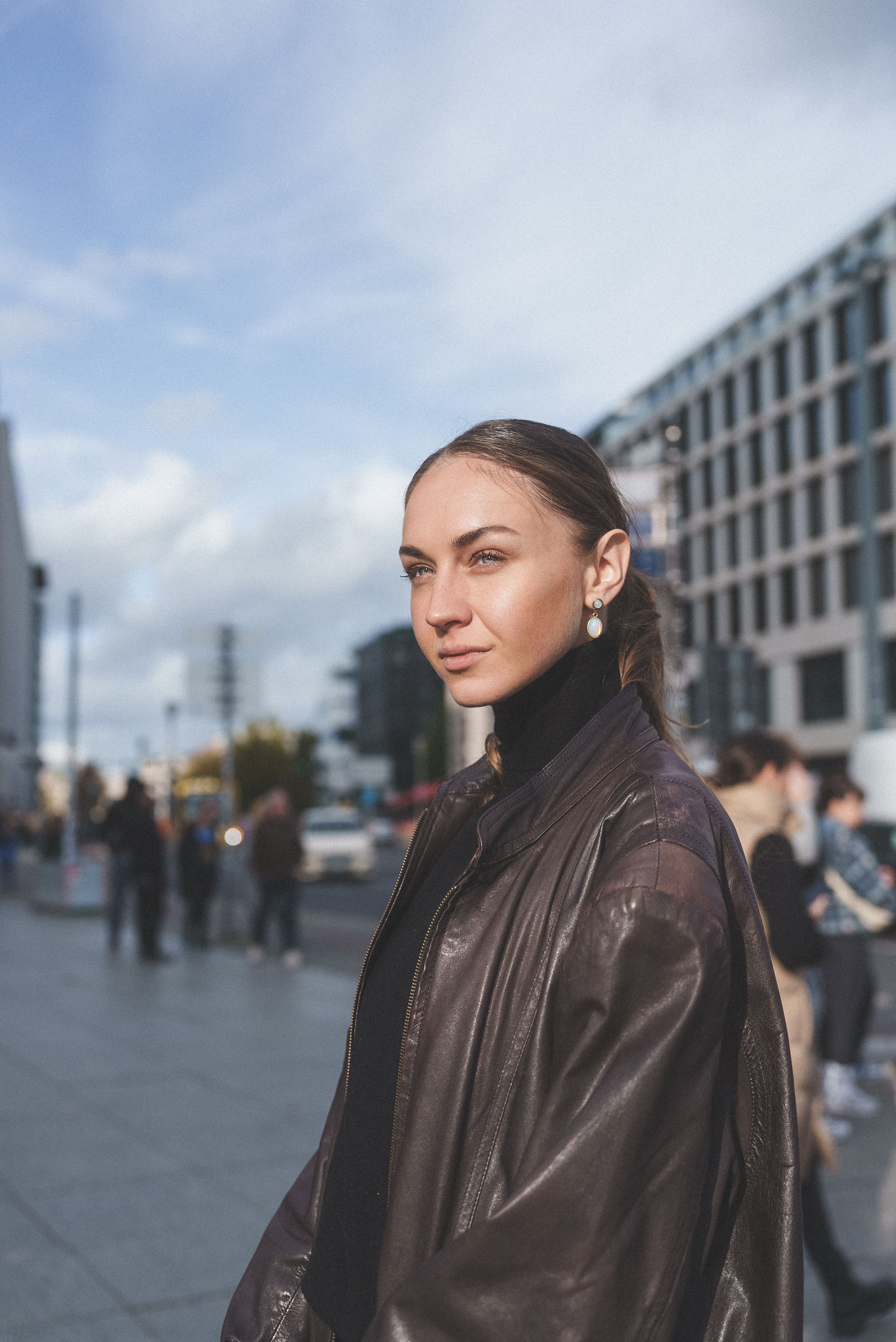 Young Woman in a Leather Jacket Standing on a Sidewalk in City · Free ...