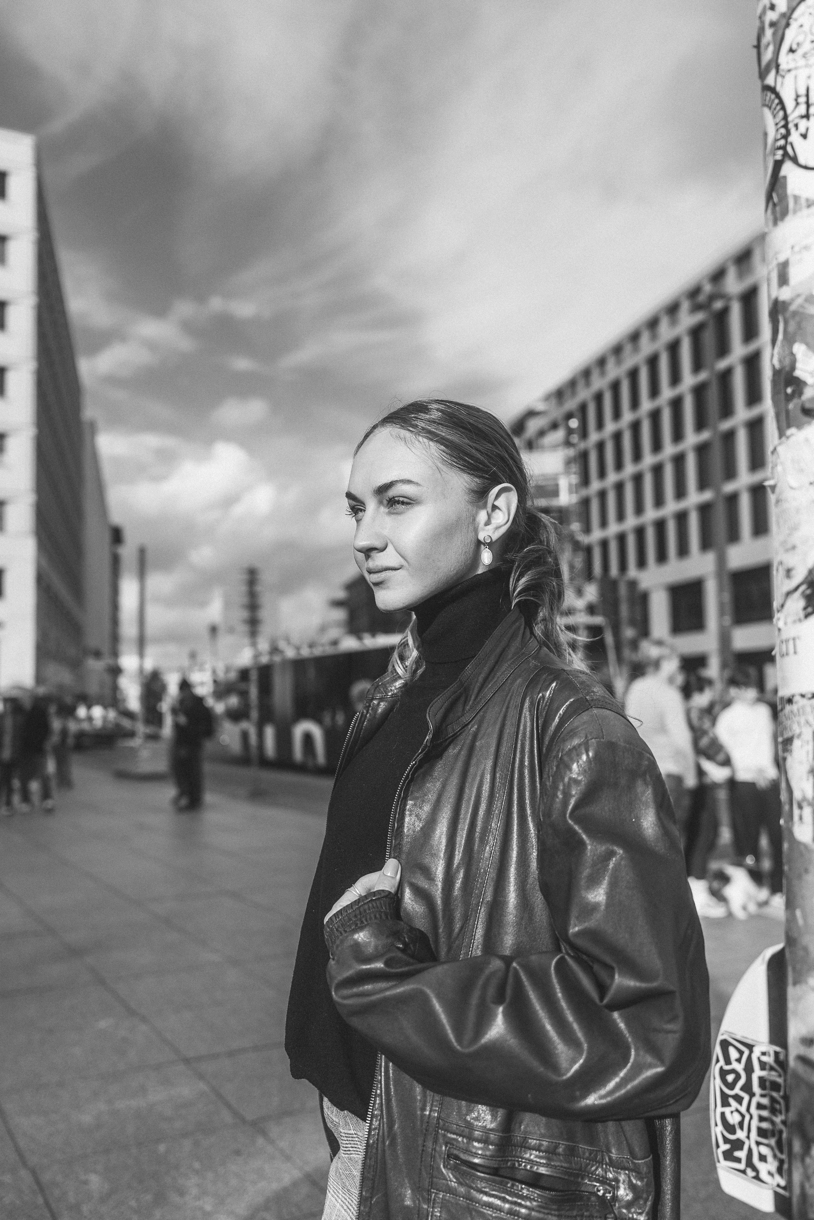 Young Woman in a Leather Jacket Standing on a Sidewalk in City · Free ...