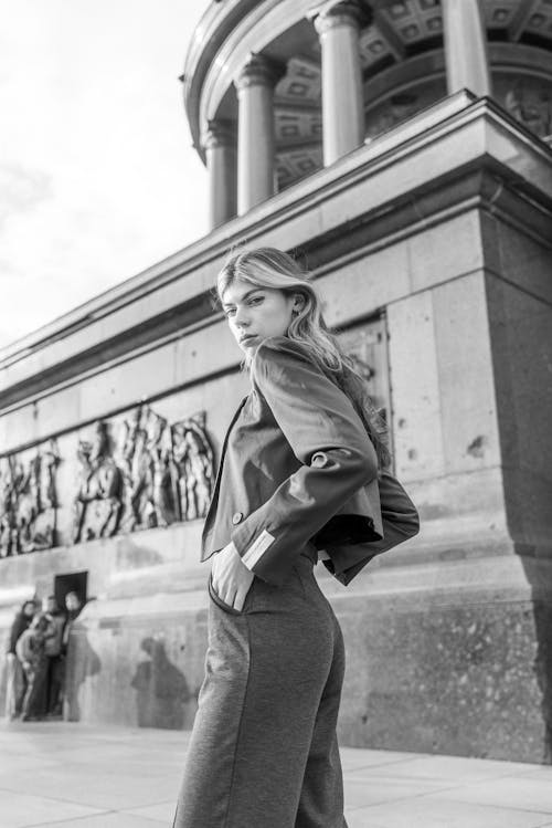 Free Model Wearing a Cropped Blazer Posing by the Berlin Victory Column Stock Photo