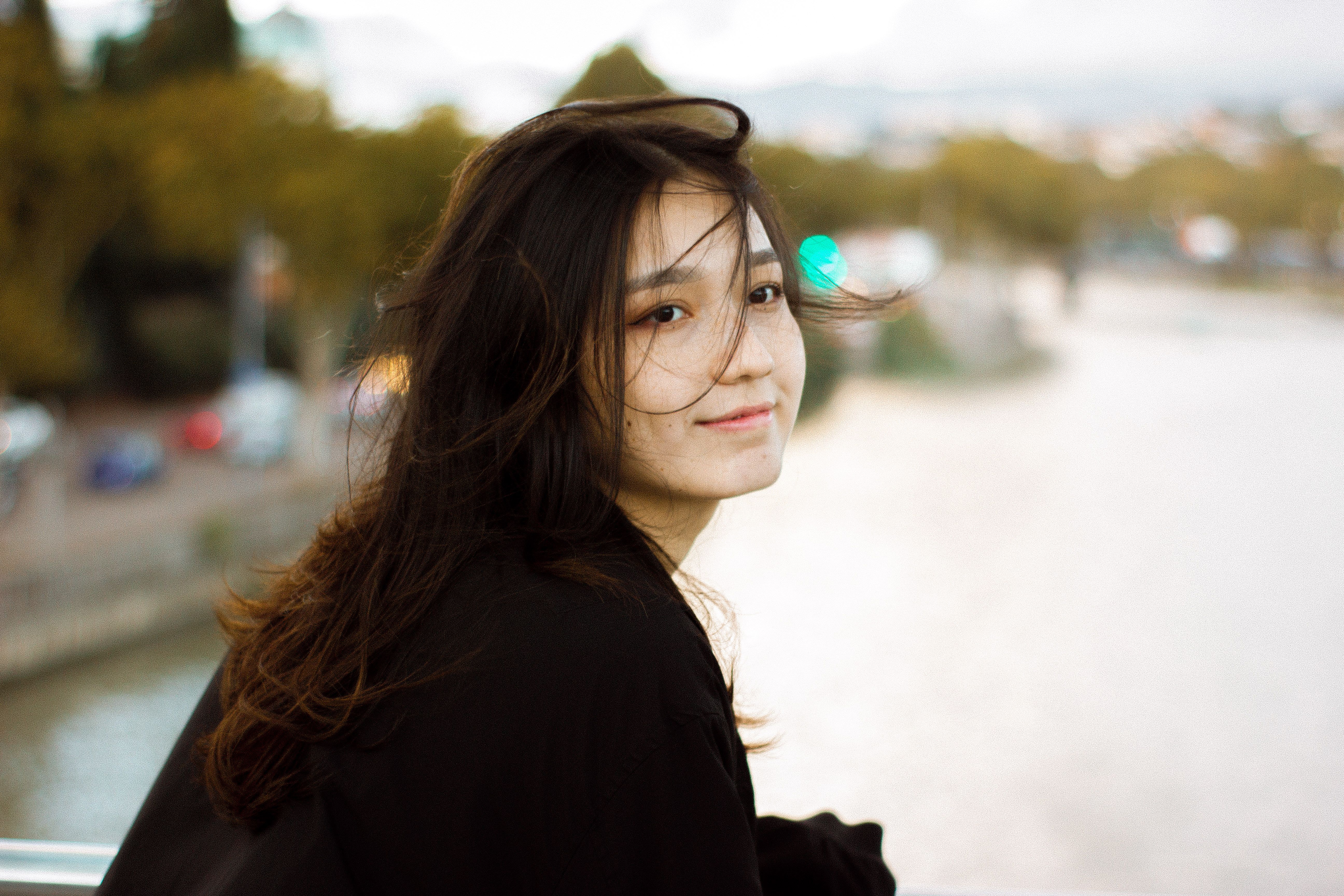 Portrait of Woman by the River · Free Stock Photo