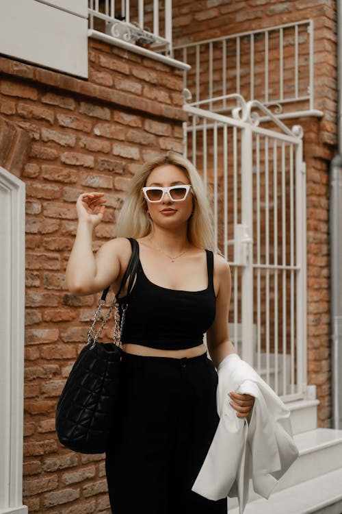 Blonde Woman Wearing Black Outfit