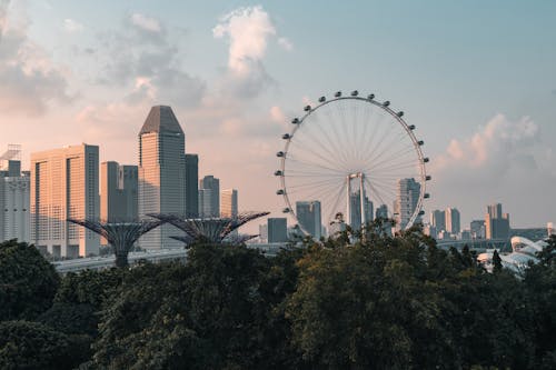 Skyline of Singapore with View of the Singapore Flyer at Sunset