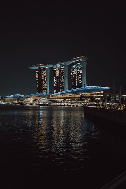 Buildings on Sea Coast in Singapore at Night