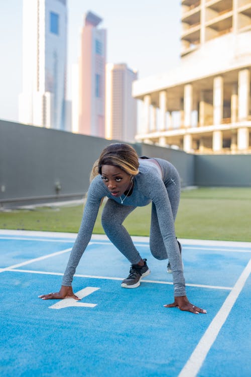 Female Sprinter on a Starting Line