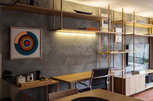 Free Contemporary interior design featuring wooden shelves, a desk, and modern decor. Stock Photo