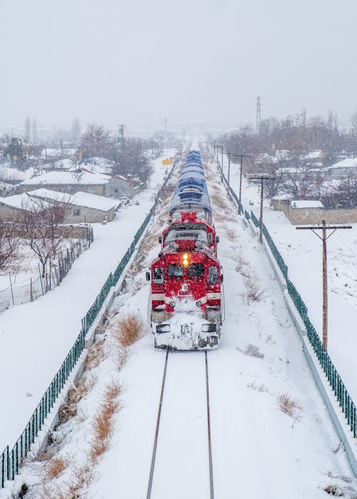 Train on Tracks Covered with Snow
