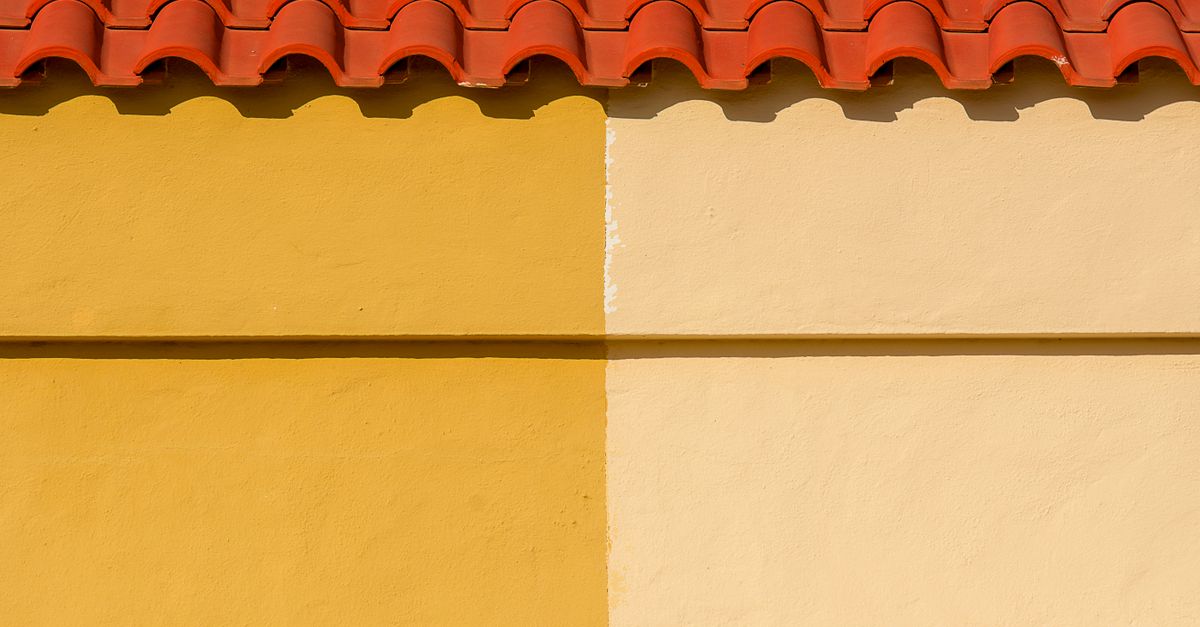 Yellow Roff Texture Roof on a Yellow Building · Free Stock Photo