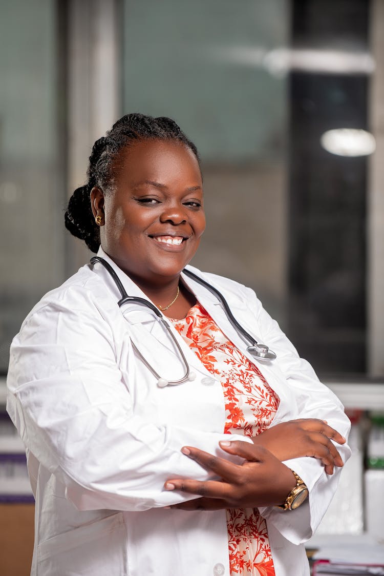 Portrait Of An African Woman In Medical Apron