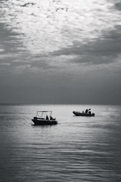 Motorboats on Open Sea in Black and White