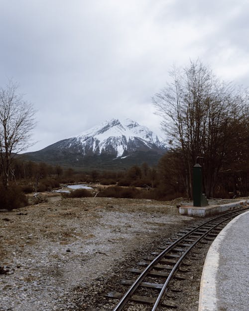 Mountain Peak in Snow Seen from Road