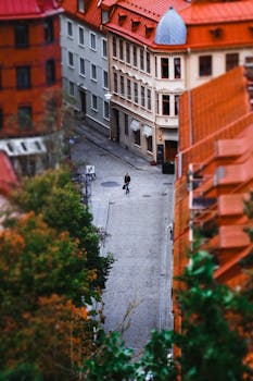 Captivating aerial view of a pedestrian on autumn streets in Goteborg, Sweden.