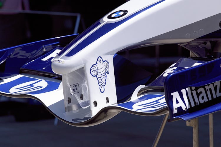  Nose Of The Williams FW24 Racing Car With Michelin Tire Man