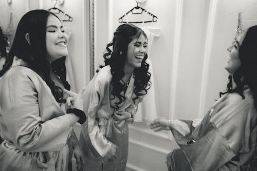 Laughing Women in Dressing Room