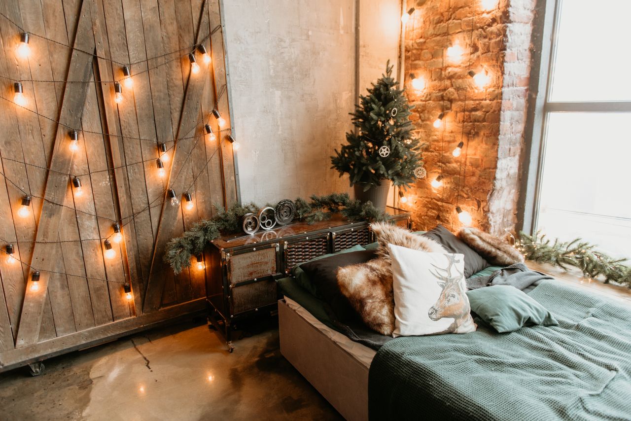 warm festive bedroom with christmas lights and rustic decor perfect fo