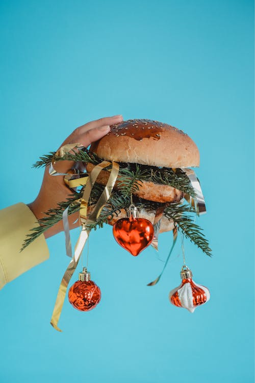 Burger Bun with Coniferous Twigs and Christmas Ornaments