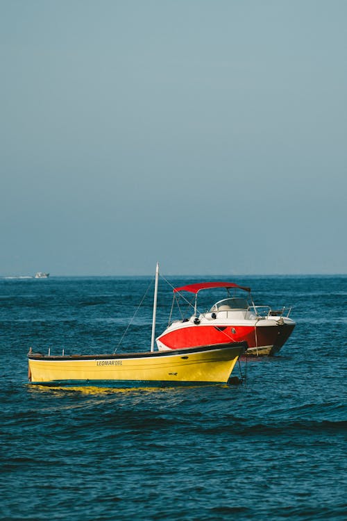 View of Empty Boats on a Sea near the Shore