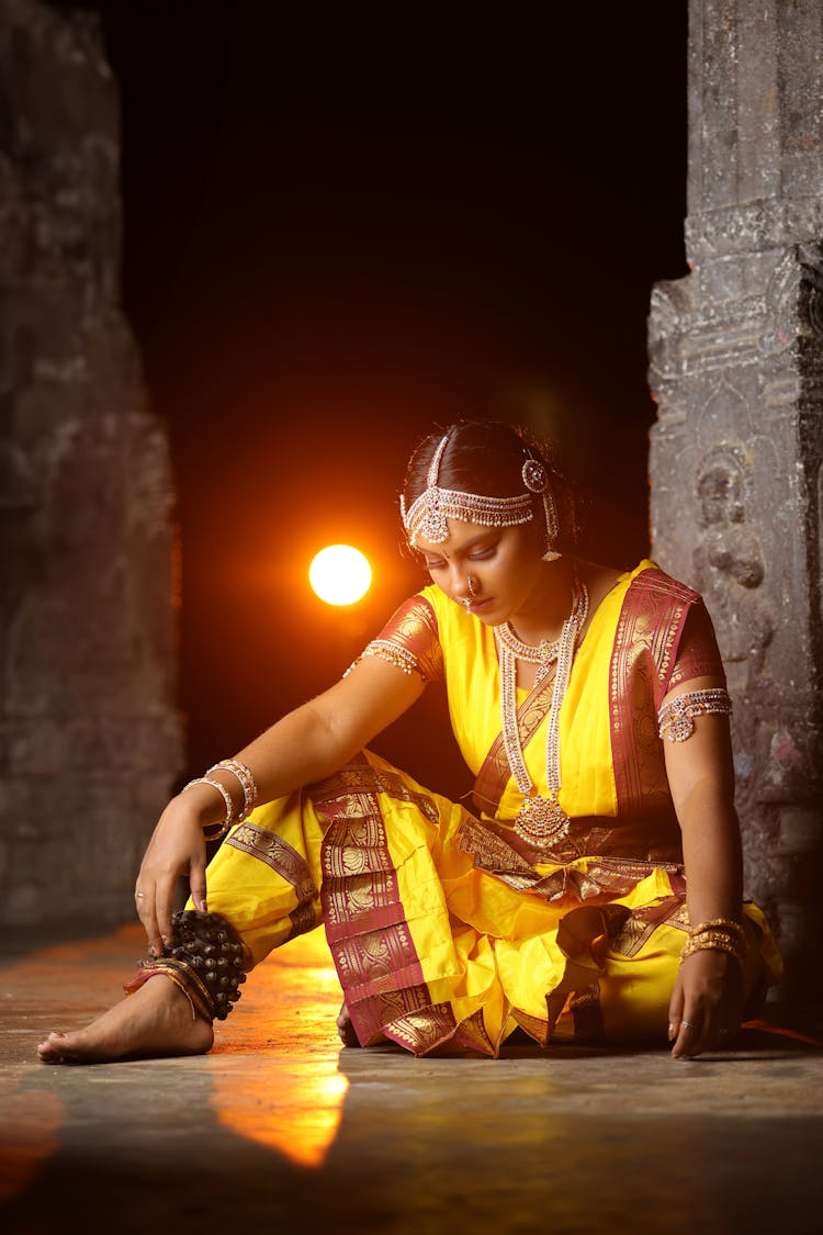 Indian Classical Dancer Sitting On Floor