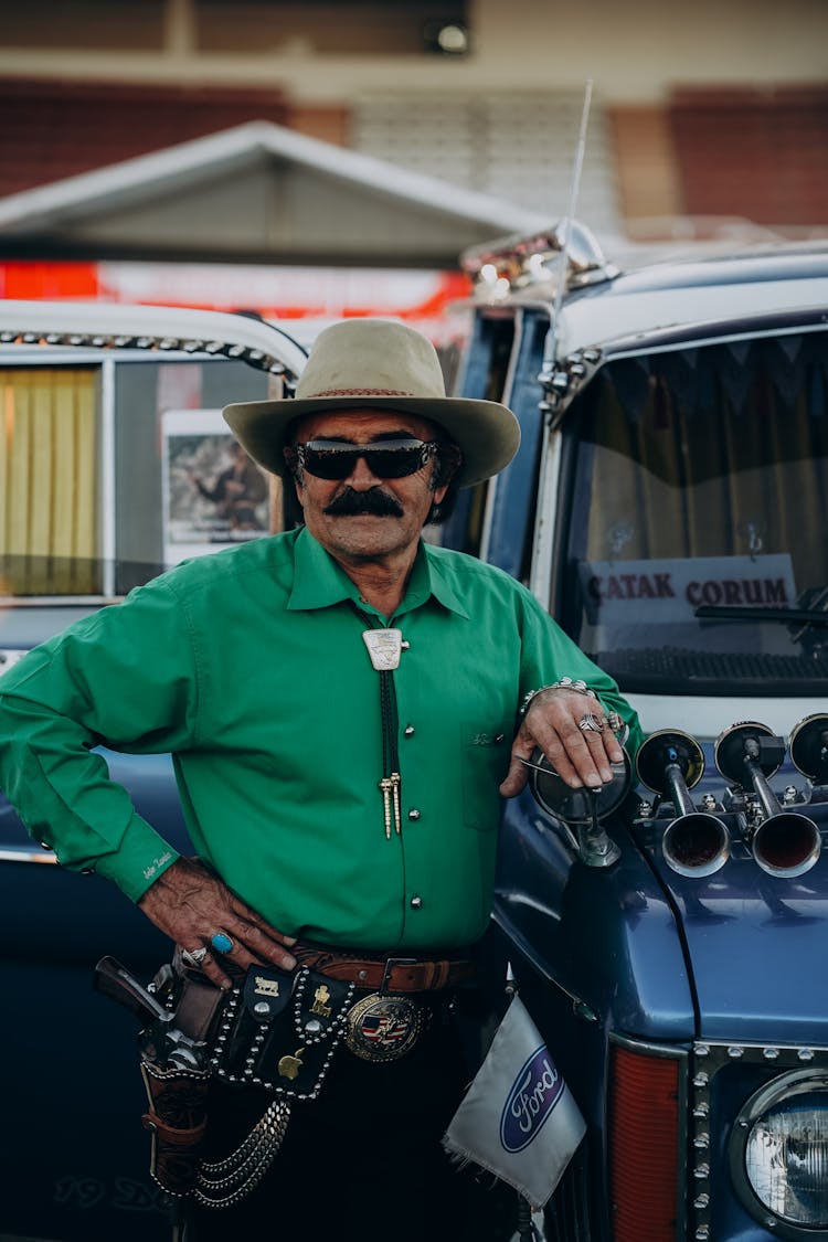 Cowboy Style Man By His Car